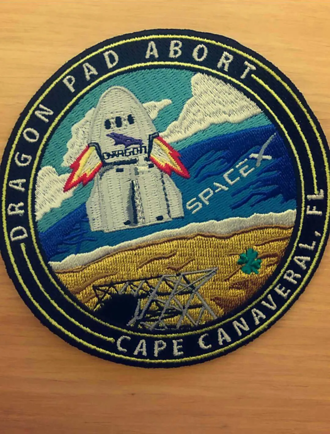 An embroidered Dragon Pad Abort mission patch from Cape Canaveral.